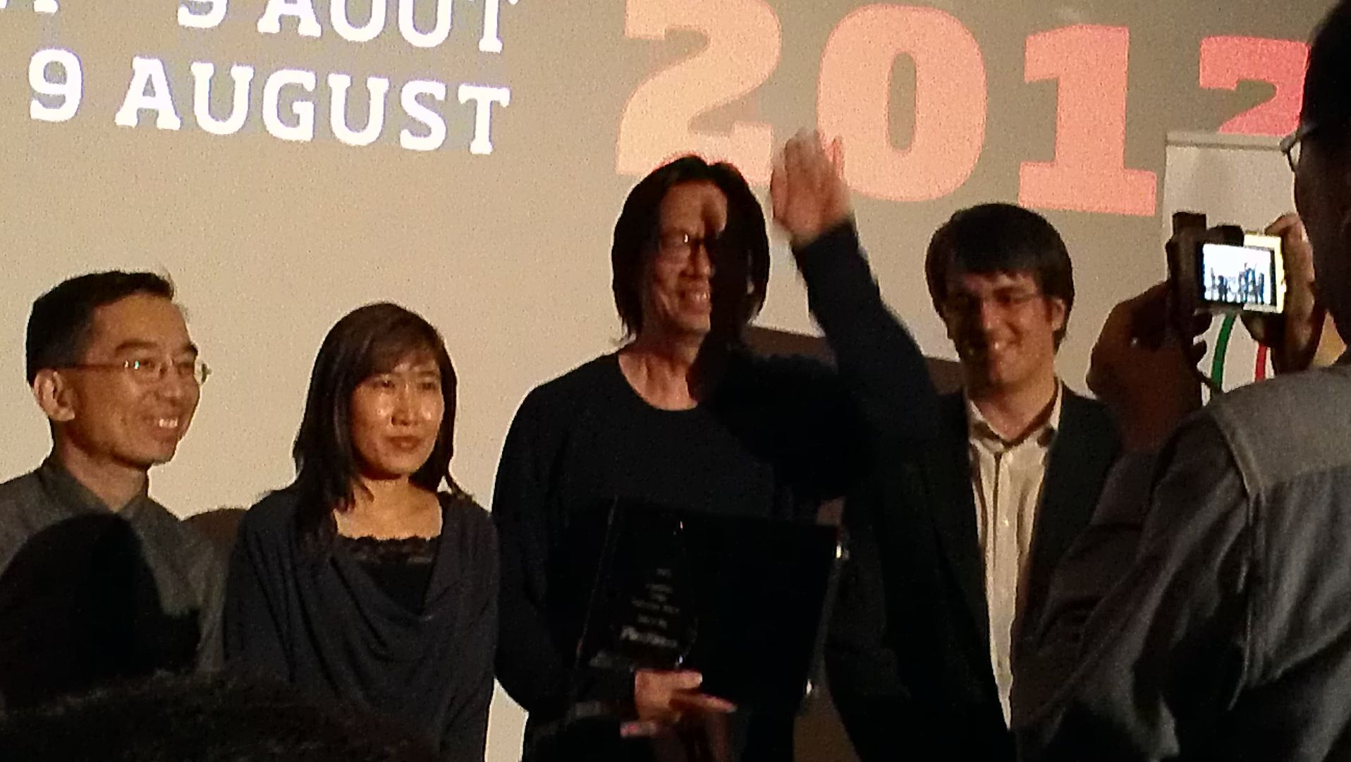 David Wu &amp; company, David Wu receives an award for his contributions to action cinema